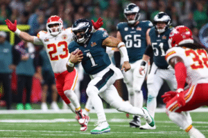 Jalen Hurts walking off the field after Super Bowl LVII
